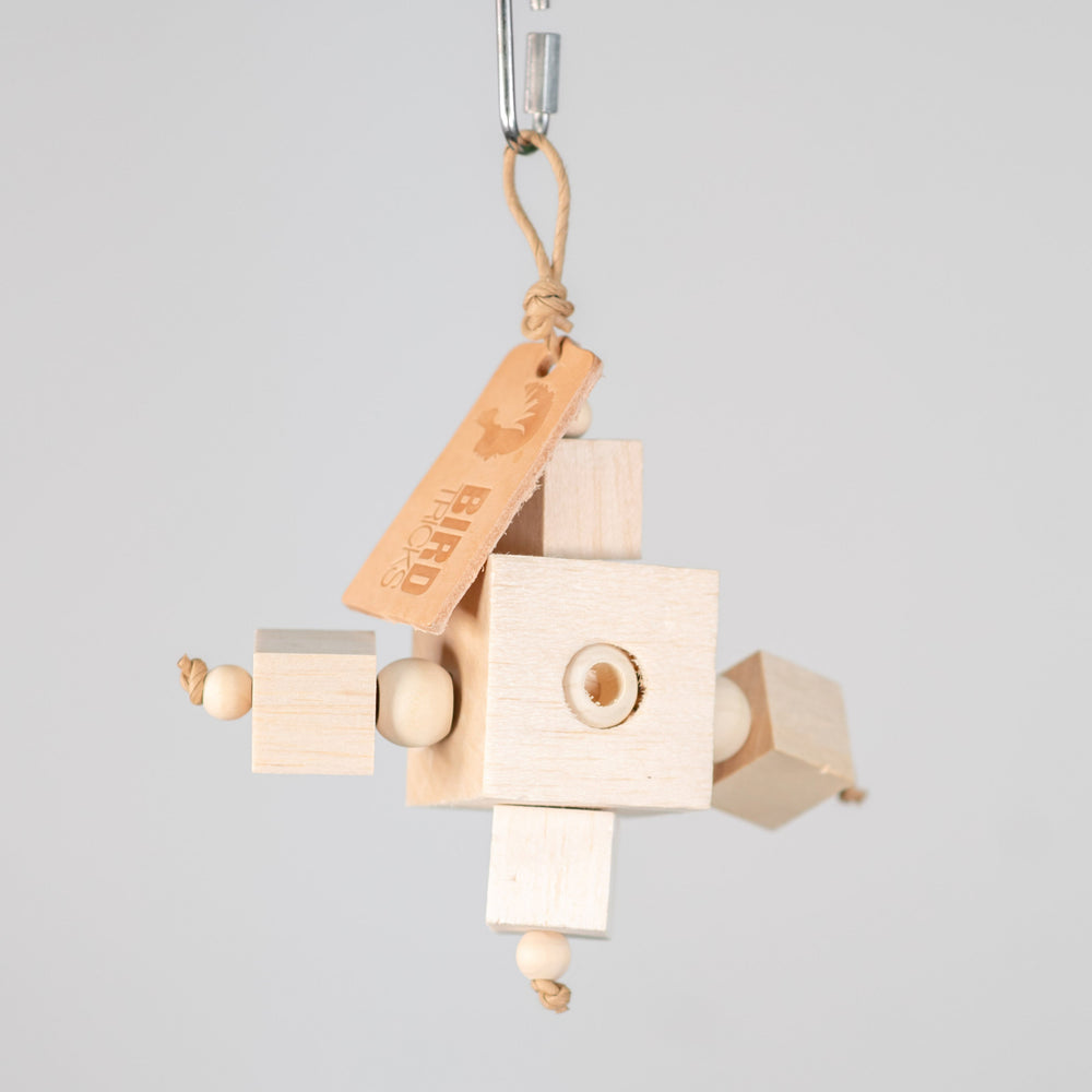 Balsa Block Party small chunky bird toy with large balsa cubes and rotating pine ball treat chambers for foraging parrots