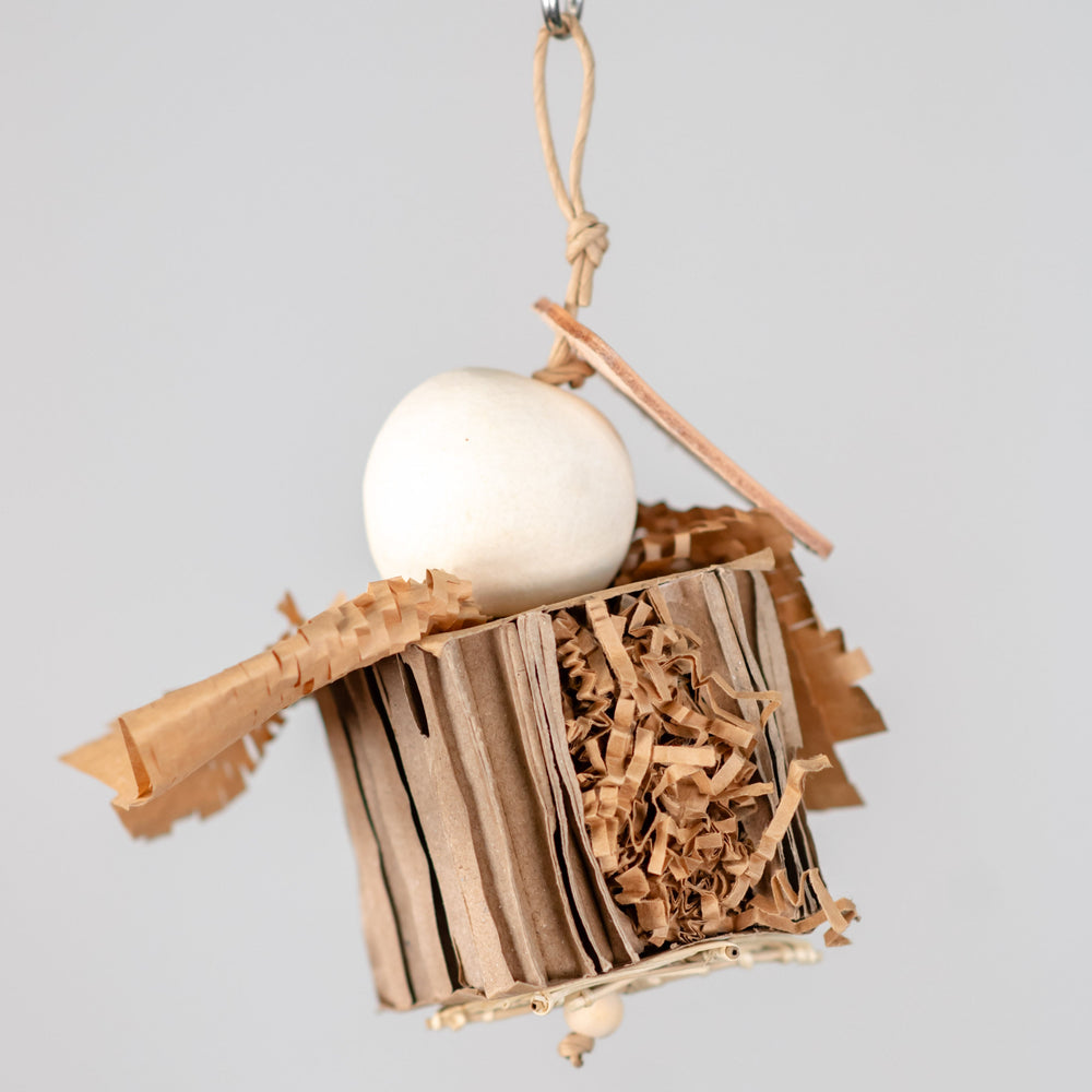 Cardboard Cruncher small foraging bird toy with cardboard, bael pod, and natural textures for shredding, treat hiding, and parrot enrichment