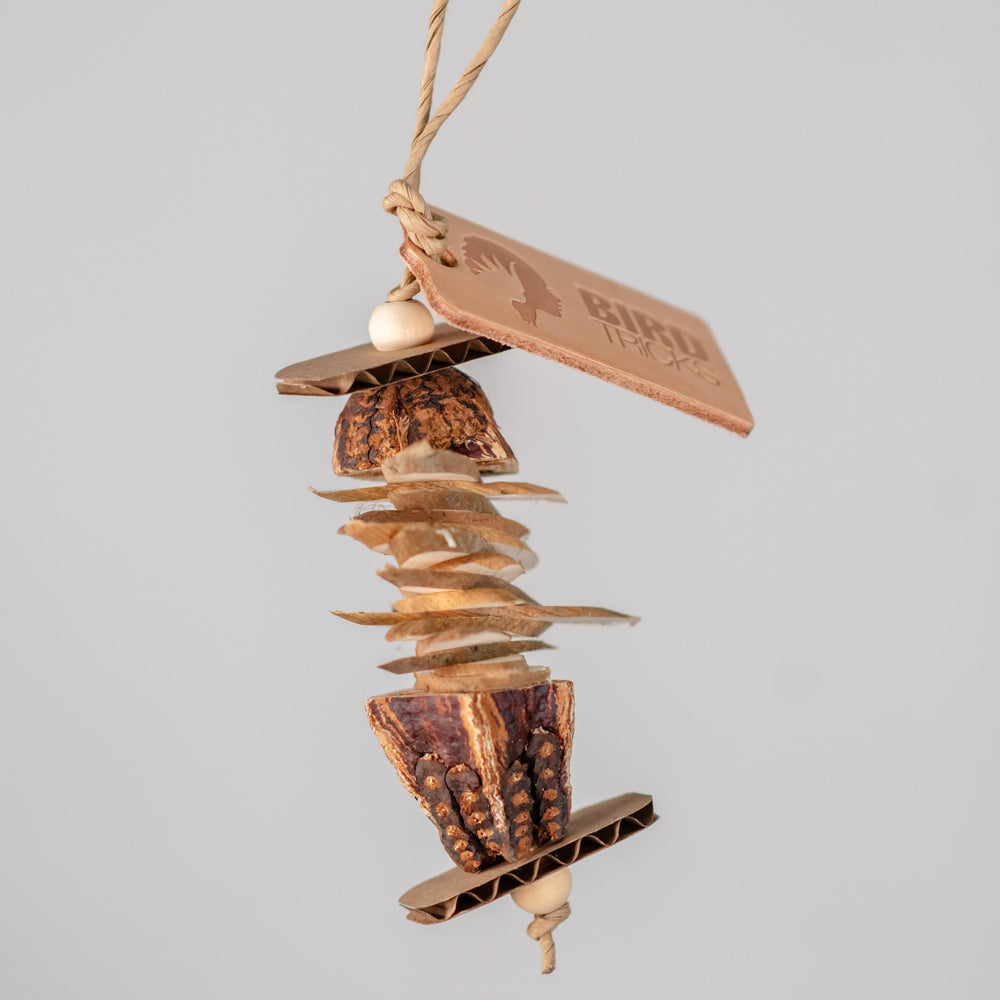 Mahogany Sandwich bird toy – tiny chunky toy with mahogany pods and cardboard ends for destructive play and seed-hiding fun
