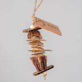 Mahogany Sandwich bird toy – tiny chunky toy with mahogany pods and cardboard ends for destructive play and seed-hiding fun