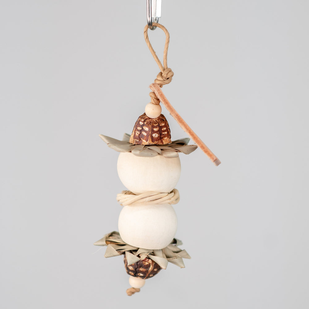 Natural Pod Blossom bird toy – small foraging toy with pods, palm flowers, and vine wreath for treat hiding and parrot enrichment