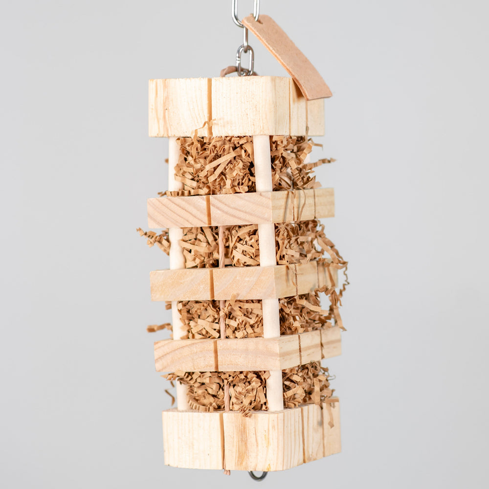 Tower of Forage large bird toy with pine wood blocks and crinkle paper core, combining chunky destruction and foraging for parrots